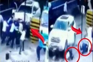 Video: Car driver presses accelerator, swings open door, hits several people in toll plaza