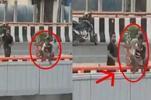 Watch Dramatic Video: Man tries to jump off flyover for BIZARRE reason!