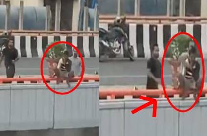 Watch Video: Man tries to jump off flyover for BIZARRE reason