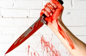 Woman stabbed by ex-lover in office