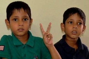 Woman strangulates mentally challenged sons to death; kills self