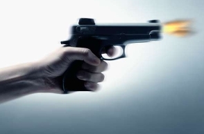 Youngster shot over affair with neighbour's wife