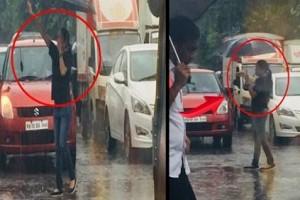 Caught On Cam: Check What This Mystery Girl Is Doing In Rain!
