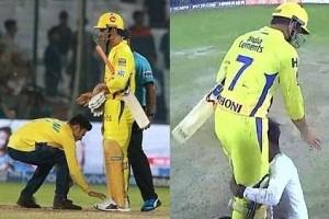 Crazy fans break through security to touch MS Dhoni's feet: See Picture