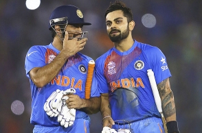 Kohli presents Dhoni with platinum bat on his 300th ODI