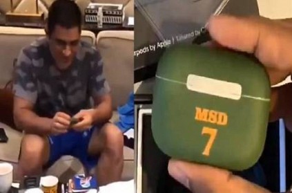 msdhoni reacts as he opens customized airpods balidaan insignia