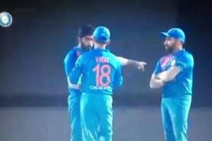 Virat Kohli and Jasprit Bumrah ignore Rohit Sharma during match