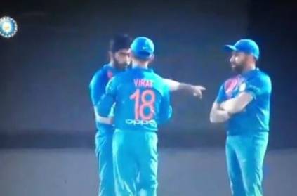 Virat Kohli Jasprit Bumrah ignore Rohit Sharma during match
