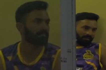What was Dinesh Karthik doing in this team\'s dressing room?