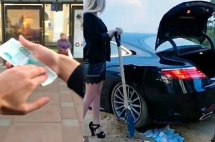 Rich Russian kid filmed throwing money out from his car window