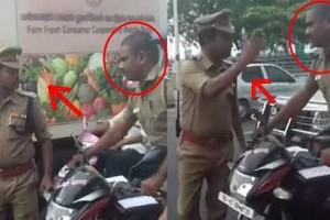 Watch Video: Assistant Commissioner warns sub-inspector for not wearing helmet!