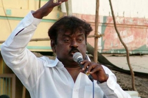 Conduct raids at the premises of EPS and OPS: Vijayakanth