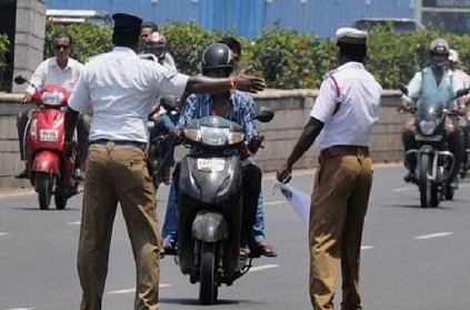 Kovai traffic police introduce swiping machines to charge fine on road Kovai introduces new method to charge fine from commuters