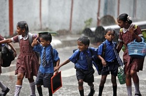 Schools reopen, more rain predicted