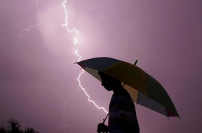 Three struck by lightning, two dead