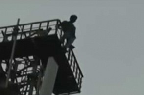 TN youngster climbs on top of cell phone tower and threatens suicide! Here's why