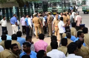 Transport employees protest along with family members