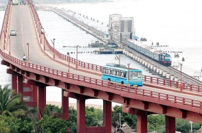 Van overturned on Pamban road bridge, 15 injured
