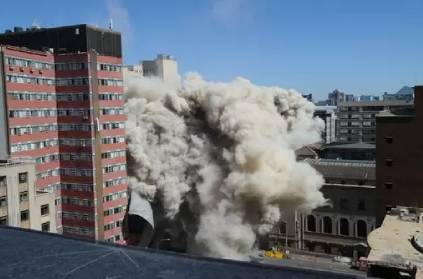 108 metre lisbon tower demolished in johannesberg SA. Video