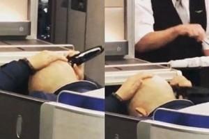 Bizarre video! Man shaves his head during flight, goes viral.