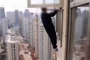 Video Viral: Man Climbs Out Of 23rd-Floor Window to escape from police