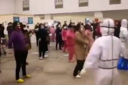 Medical staff dance with coronavirus patients in Wuhan hospital