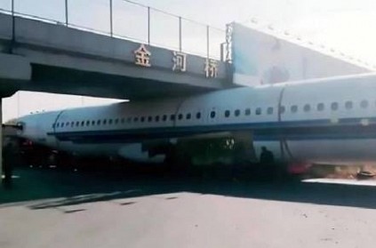 Plane getting stuck under a footbridge in China: Watch Video  