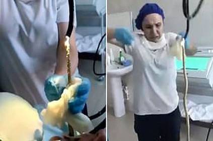Russia doctor pulls out 4feet snake from womans mouth viral video