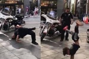Watch Video: Dance Challenge Between Policeman & Child On Street Is EPIC!