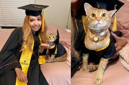 woman graduates from university along with her cat