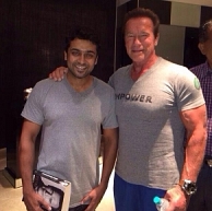 Suriya meets Arnold Schwarzenegger