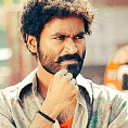Dhanush fights it out in rain