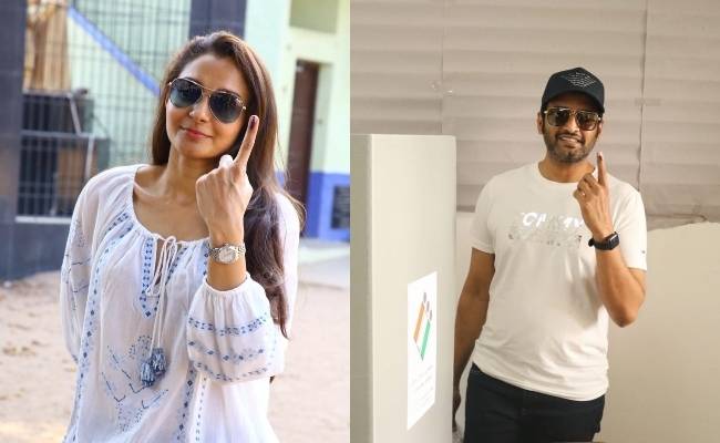 Andrea and Santhanam make heads turn at their respective booths