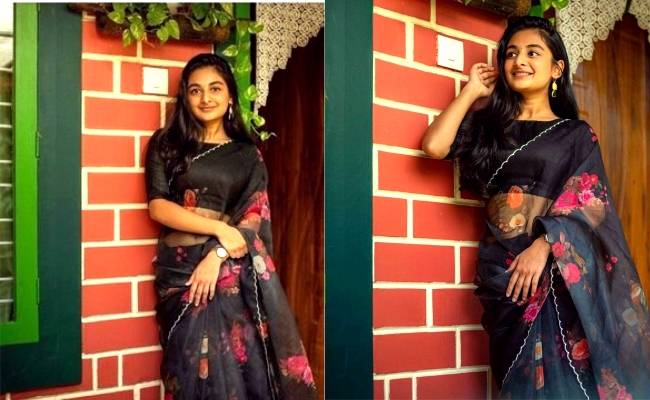 Esther Anil seems to be loving her sarees and we love her
