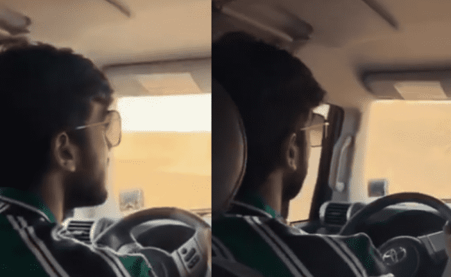 Kalidas Jayaram drives into the Dubai desert