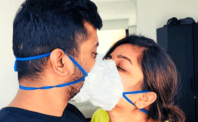 Nandhini actress Nithya Ram's Corona kiss with husband is going viral