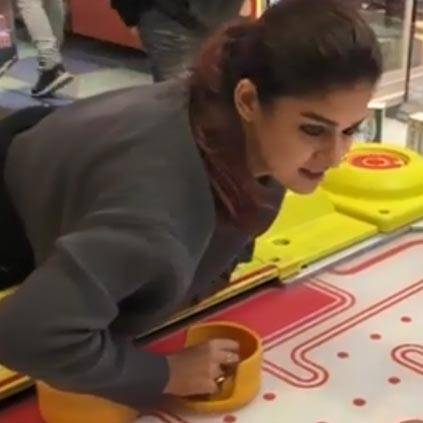 Nayantara plays air hockey with Vignesh Shivn