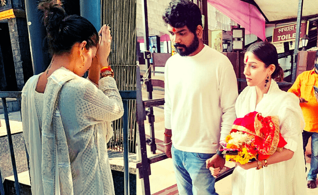 Nayanthara and Vignesh Shivan holding hands and twinning in WHITE is a sight to behold; viral pics