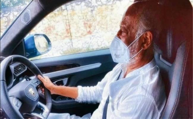 Seen the viral image of Rajinikanth driving a luxury car as yet