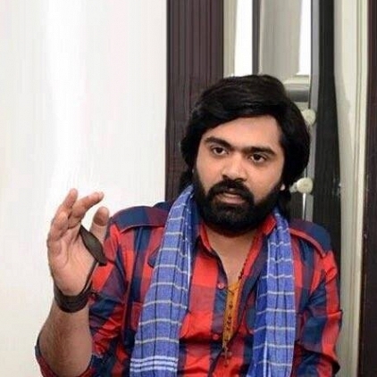 Simbu's 80 look character in AAA is named Madura Michael