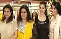 Actresses Lakshmi Rai and Urvashi take part in the shop launch of Rehana Basheer