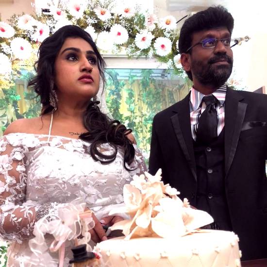 The Happy Couple all set to cut the cake