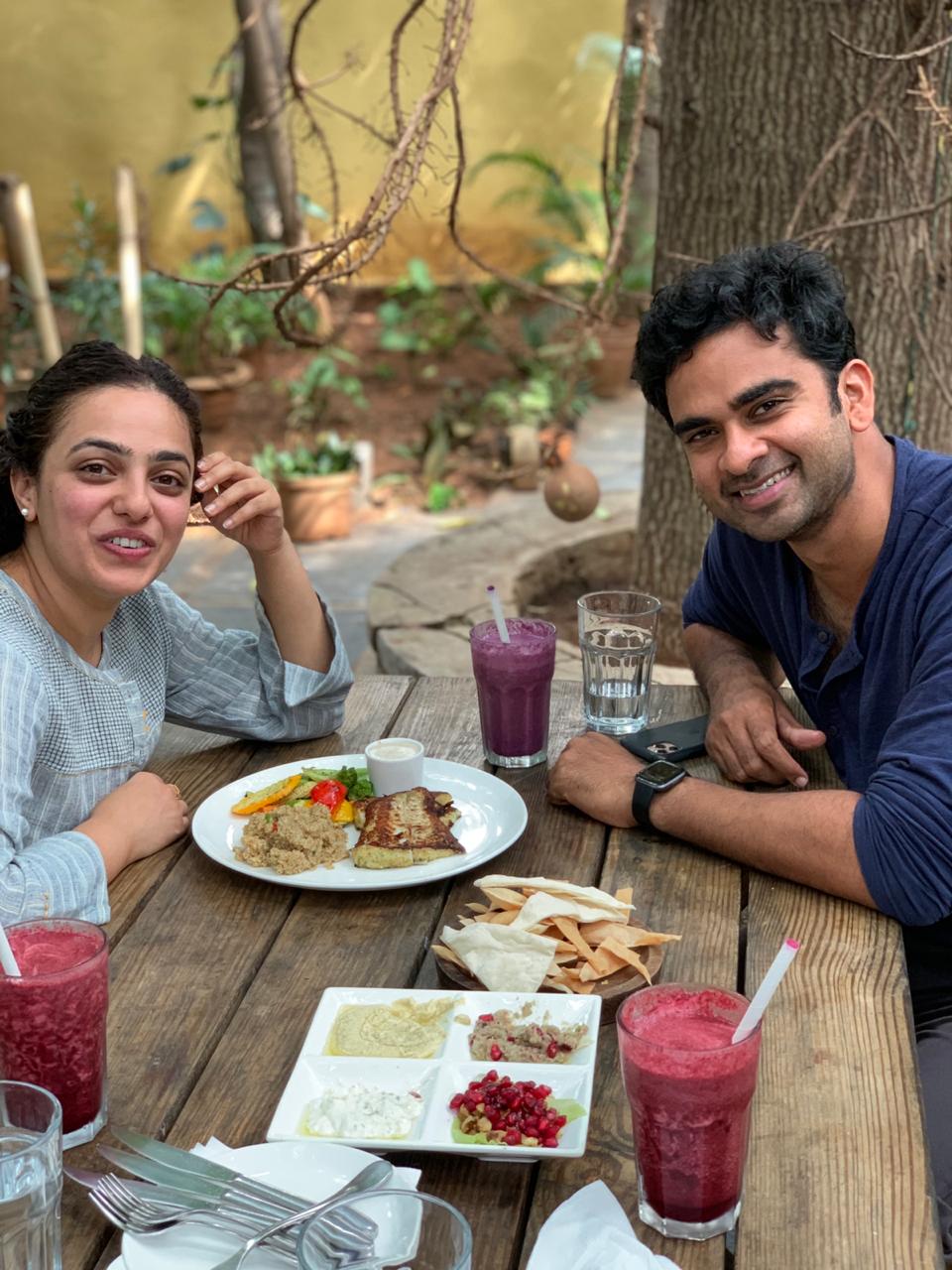 Nithya Menen and Ashok Selvan chilling on the sets