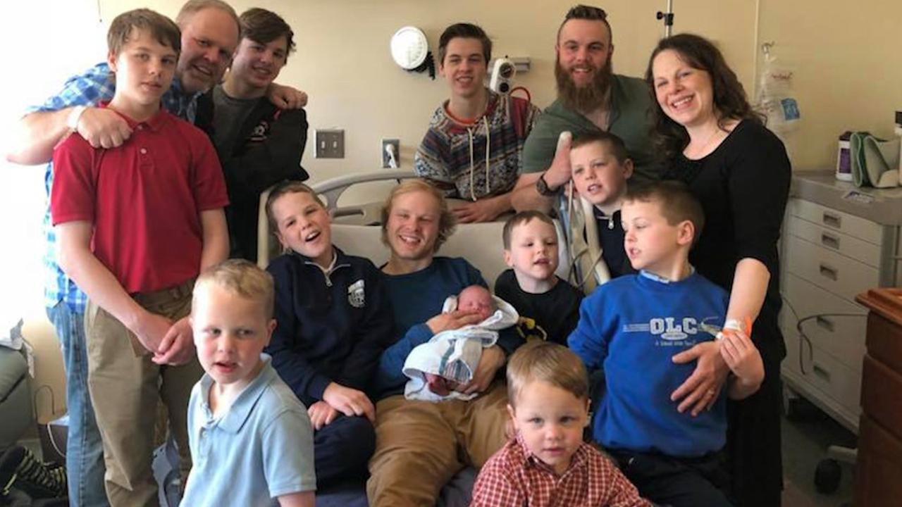 After 14 boys, this Michigan family finally welcomes a baby girl