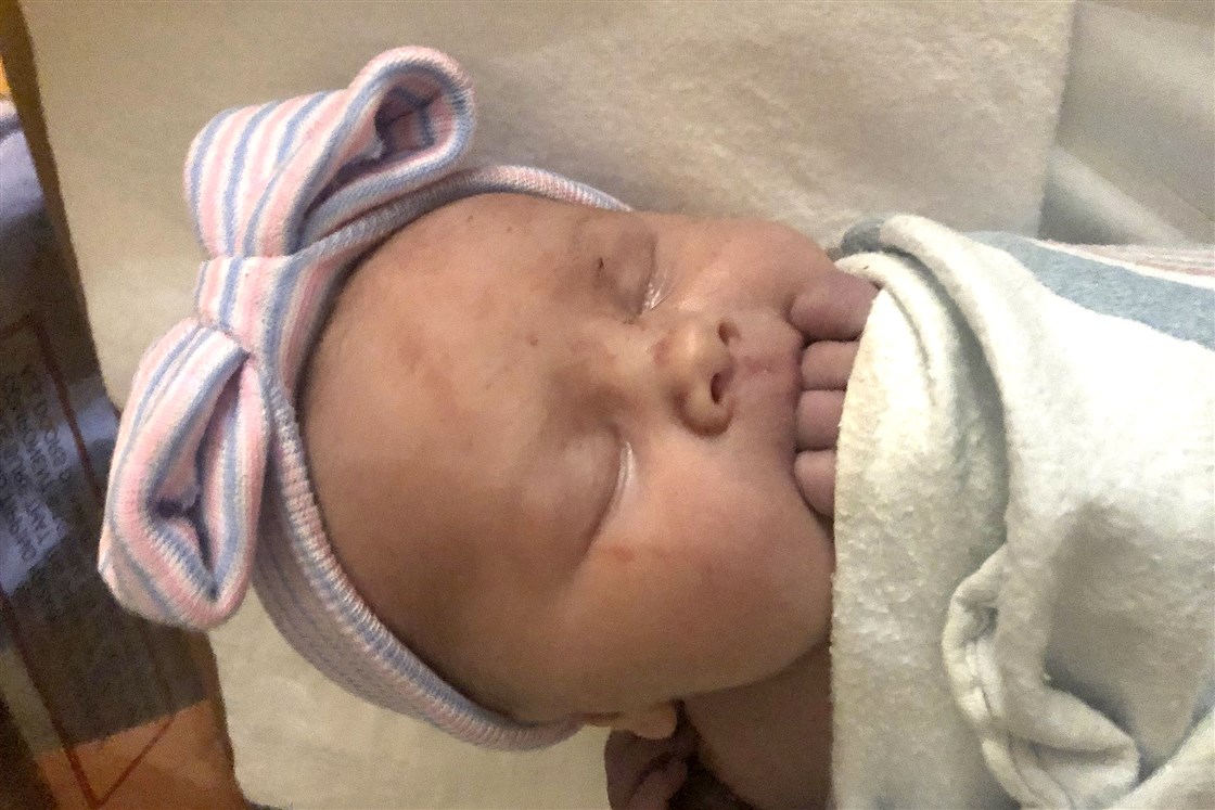 After 14 boys, this Michigan family finally welcomes a baby girl