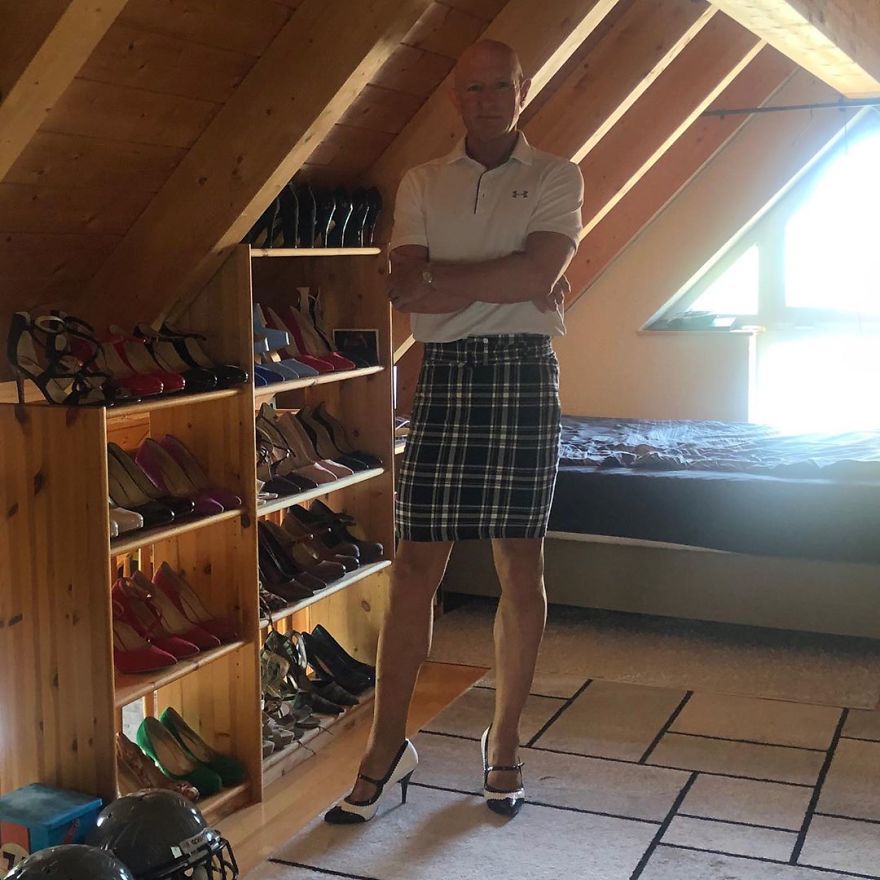 Germany man wears a skirt and heels while he goes to work