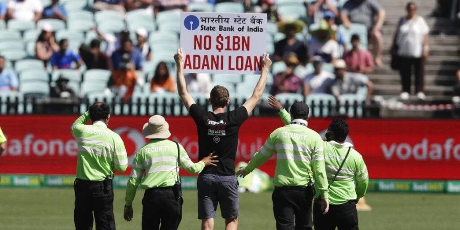 protesters enter field to protest against adani group in ausvind