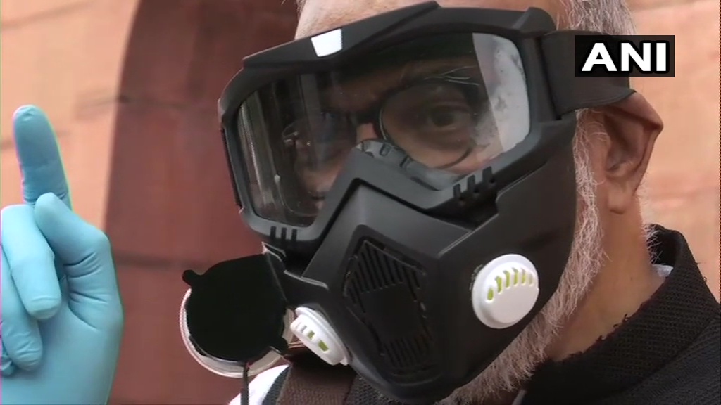 MP Narendra Jadhav wears High-Efficiency Particulate Air filter mask