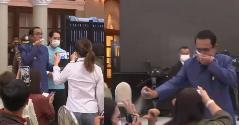 Thai PM sprays reporters with hand sanitiser to tricky questions