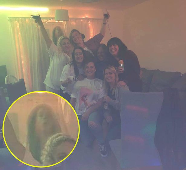 Mum spots ghostly figure in photo with her friends